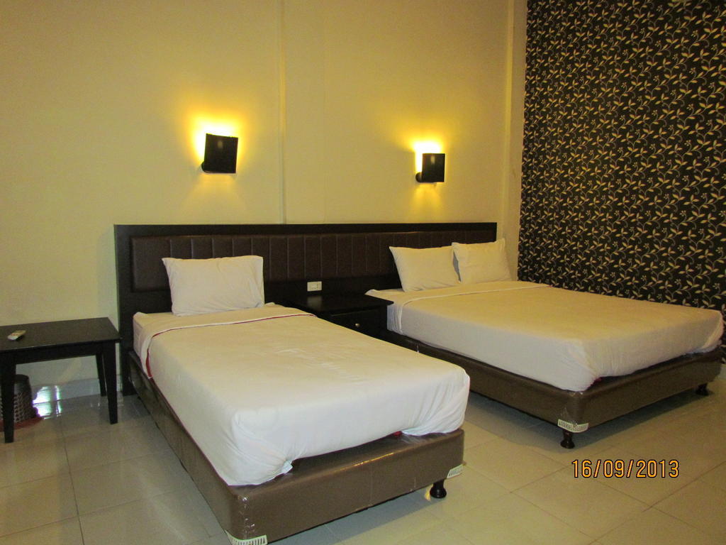 Carolina Transit Hotel Medan Quarto foto